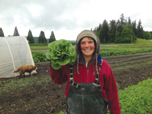 Woman holding lettuce